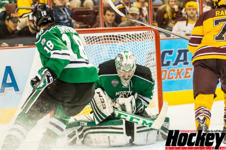 North Dakota G Zane McIntyre makes one of his 26 saves against Minnesota on April 11, 2014 at the Wells  Fargo Center in Philadelphia.