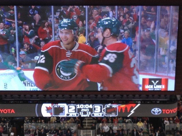 Nino Niederreiter and Michael Keranen celebrate el Nino’s second-period goal on the first of two Keranen assists on the night. (Poor quality photo / Brian Halverson)