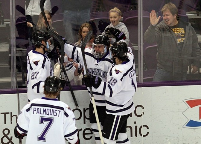 Bryce Gervais (center) celebrates with teammates after scoring one of his two goals in a Feb. 14, 2014, game against Alabama-Huntsville at the Verizon Wireless Center in Mankato. (Photo / Minnesota State University Athletics)