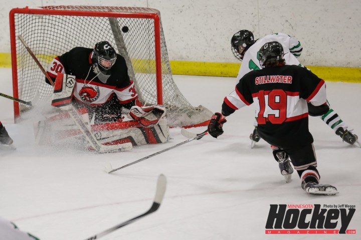 Hill-Murray's Tyler Nowak  puts the Pioneers up 2-0 in the second period of their 4-0 Section 4AA final win over Stillwater at Aldrich Arena. (MHM Photo / Jeff Wegge) 